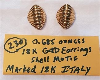 18k gold earrings w shell motif marked 18k Italy