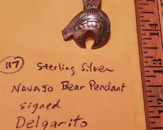 bear pendant by Navajo silversmith Delgarito
