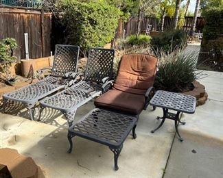 Pool lounge chairs with table