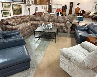 View of the showroom. Large Vintage Sectional in Great Condition, other furnishings