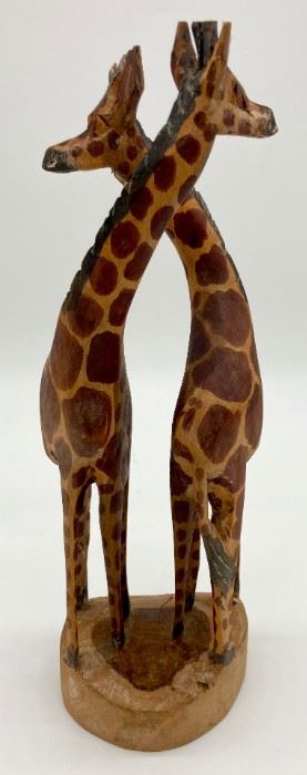 Vintage wood carved giraffes
