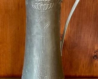 Antique metal pitcher