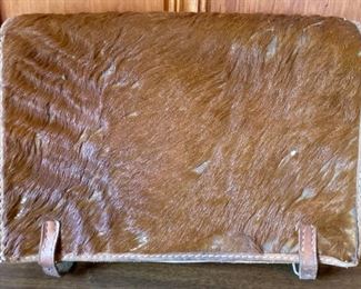 Antique leather and fur attache