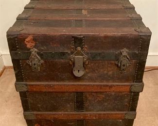 Antique banded storage trunk