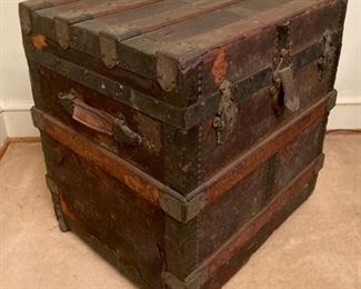 Antique banded storage trunk