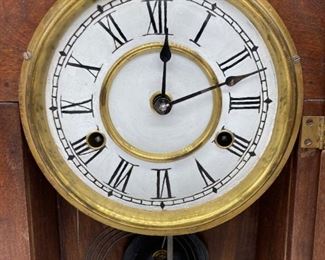 Antique gingerbread pendulum clock