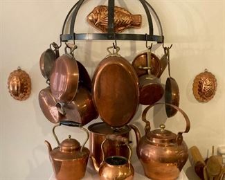 Copper pots, pans and kettles