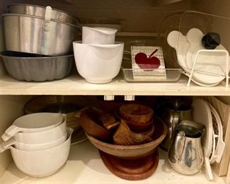 Assorted kitchenware including mixing bowls, bakeware