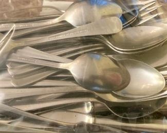 Assorted flatware uncluding International Silver Co., Northland stainless, Excel stainless, Riviera, Wesley Forge stainlessSpirit of America stainless, Towle stainless