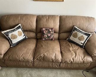 Leather couch with matching loveseat