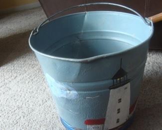 Bucket painted with lighthouse