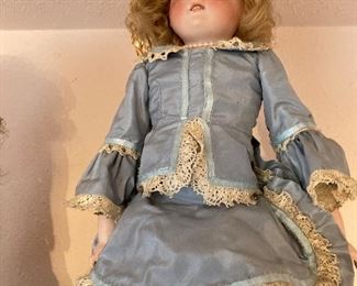 German porcelain doll, leather body, original clothes