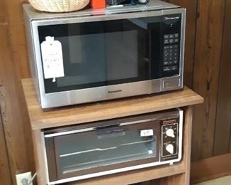 Items on top of microwave have changed location, still in the kitchen though.