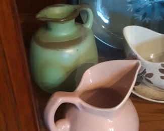 Green, you know that's Frankoma!  The pink pitcher is Red Wing Pottery.