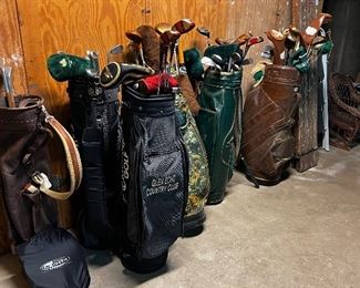 Golf bags and clubs