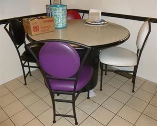 Contemporary table & chairs..the table has finish issues around the edges, the chairs are perfect.