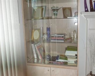 Another glass curio cabinet with touch-button light