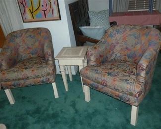 Pair of barrel-type upholstered chairs
