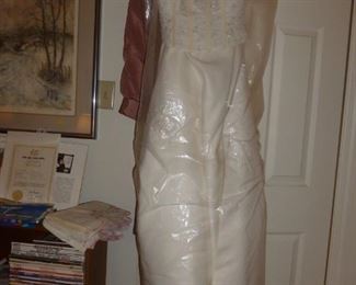 Brand New..Never Worn WEDDING DRESS..Can be altered to fit