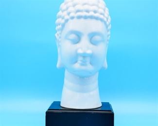 Ceramic Buddha Sculpture on Wooden Base
