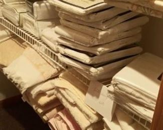 towels and bed linens; many still in packaging
