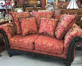 Nice Love Seat with Rolled Arms and carved frame.  Like new. 5' 6" wide.  Beautiful upholstery. Includes 5 pillows.