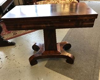 Wonderful table that swivels and makes into a card/game table. Empire style.  Also top can come up as a candle/entry table.