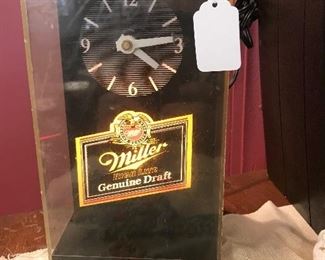 Miller Genuine Draft Bar light.  Clock needs repair. However it lights up!