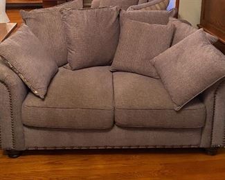 Upholstered loveseat sofa