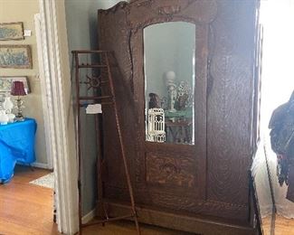 Antique oak Murphy bed with beveled mirror