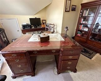 Huge hand carved two-sided executive desk