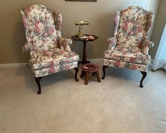 Two vintage wingback chairs