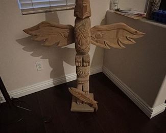 Carved wood totem pole