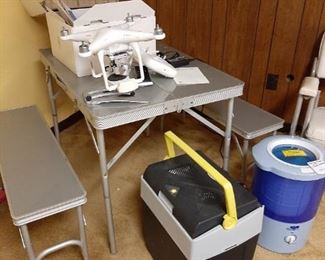 This camping table and benches fold together in one neat case