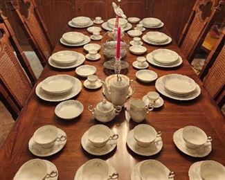 Dining room table, chairs and Mikasa china