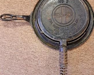 Much cast iron. Griswold "America" #8 waffle iron w/ base 1908