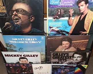 Autographed albums and disc. Mickey Gilley