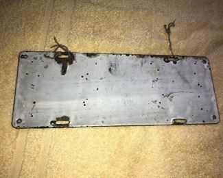 BACK VIEW OF FAMILY 1911 CADILLAC LICENSE PLATE & EXTREMELY HEAVY WEIGHT