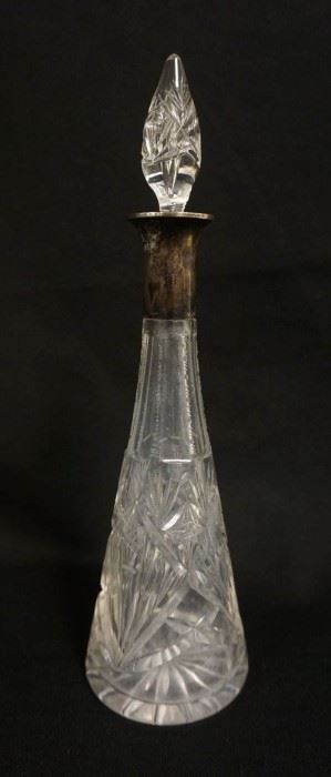 1016	CUT GLASS DECANTER W/800 SILVER BAND AT NECK, APPROXIMATELY 13 1/2 IN HIGH

