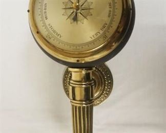 1024	GERMAN WALL BAROMETER IN A METAL CASED FORM OF A TORCH, APPROXIMATELY 21 IN HIGH

