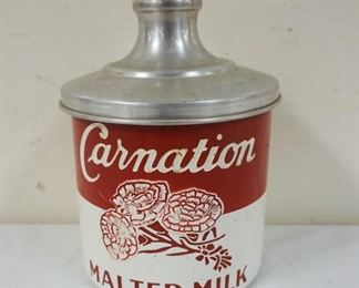 1058	CARNATION MALTED MILK EMBOSSED METAL ADVERTISING CONTAINER, APPROXIMATELY 9 IN HIGH
