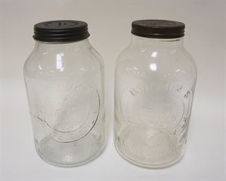 1059	PAIR OF ANTIQUE HORLICKS EMBOSSED GLASS MALTED MILK CONTAINERS, APPROXIMATELY 11 IN HIGH
