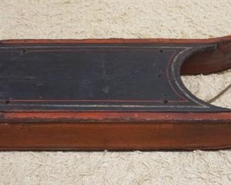 1068	ANTIQUE WOOD PAINT DECORATED CHILDS SLED, APPROXIMATELY 36 IN X 11 IN X 8 IN HIGH
