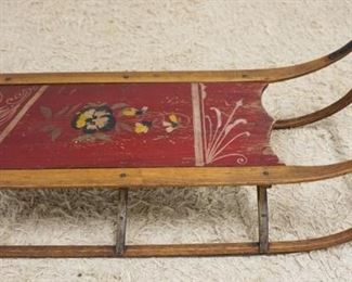 1069	ANTIQUE WOOD PAINT DECORATED CHILDS SLED, APPROXIMATELY 37 IN X 15 IN X 8 IN HIGH
