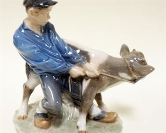 1167	ROYAL COPENHAGEN FIGURINE OF BOY PULLING COW, APPROXIMATELY 7 IN H

