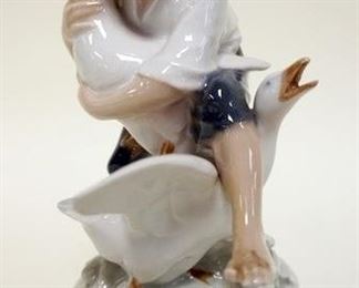 1169	ROYAL COPENHAGEN FIGURINE OF YOUNG BOY WITH GEESE, APPROXIMATELY 7 IN H
