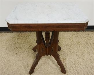 1198	ANTIQUE WALNUT VICTORIAN MARBLE TOP PARLOR TABLE, APPROXIMATELY 28 IN X 20 IN X 30 IN H
