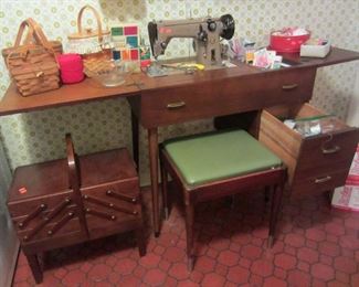 Vintage Singer sewing machine with lots of supplies