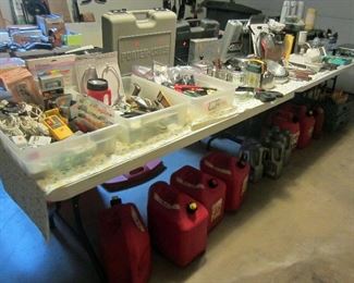 More tools, gas cans (some full), Mobile 1 oil, ....far end more kitchen items