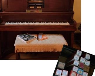 Antique Self-playing piano with a ton of music rolls